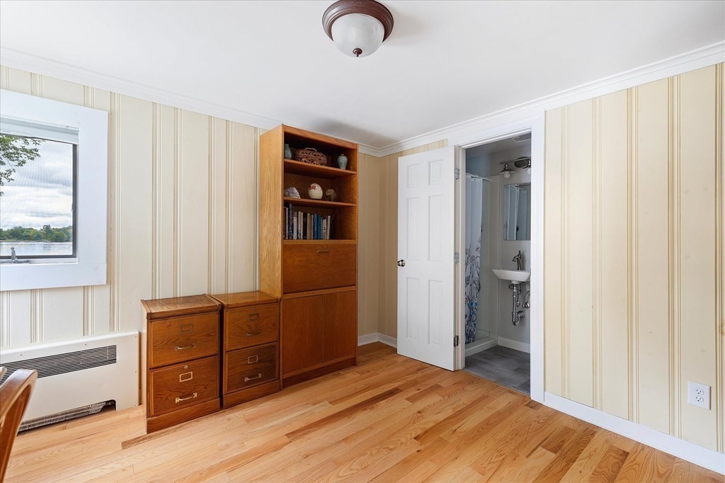 5 West Sutton Road Sutton, MA 01590 - Photo 18 of 36 a view of a bedroom with furniture and window