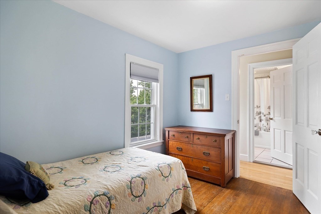 5 West Sutton Road Sutton, MA 01590 - Photo 22 of 36 a bedroom with a bed and a window