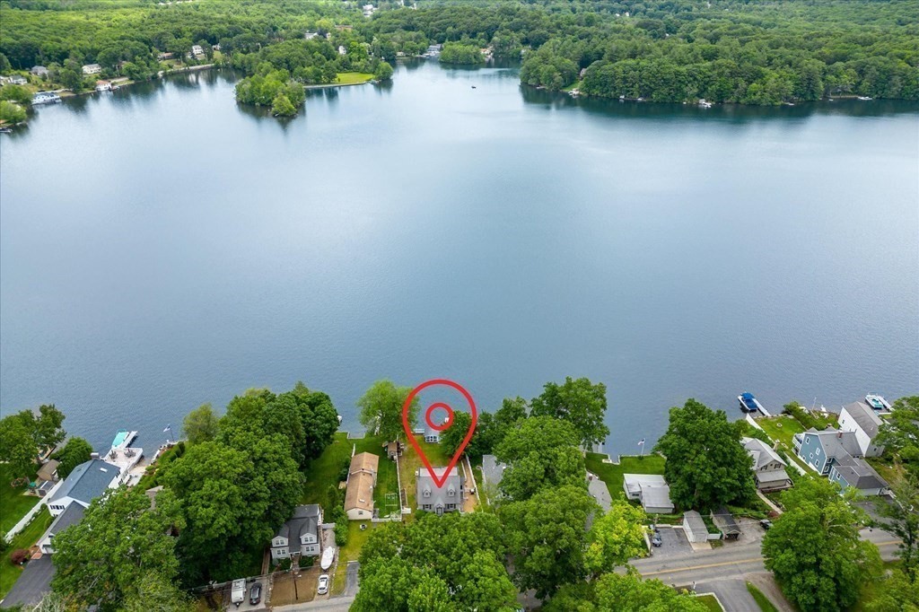 5 West Sutton Road Sutton, MA 01590 - Photo 4 of 36 an aerial view of a house with a lake view