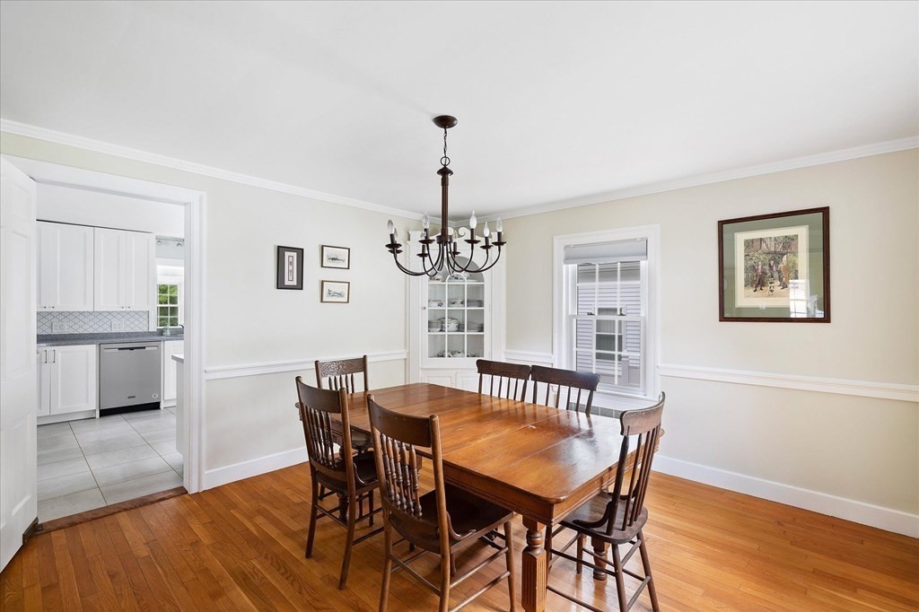 5 West Sutton Road Sutton, MA 01590 - Photo 9 of 36 a view of a dining room with furniture window and wooden floor