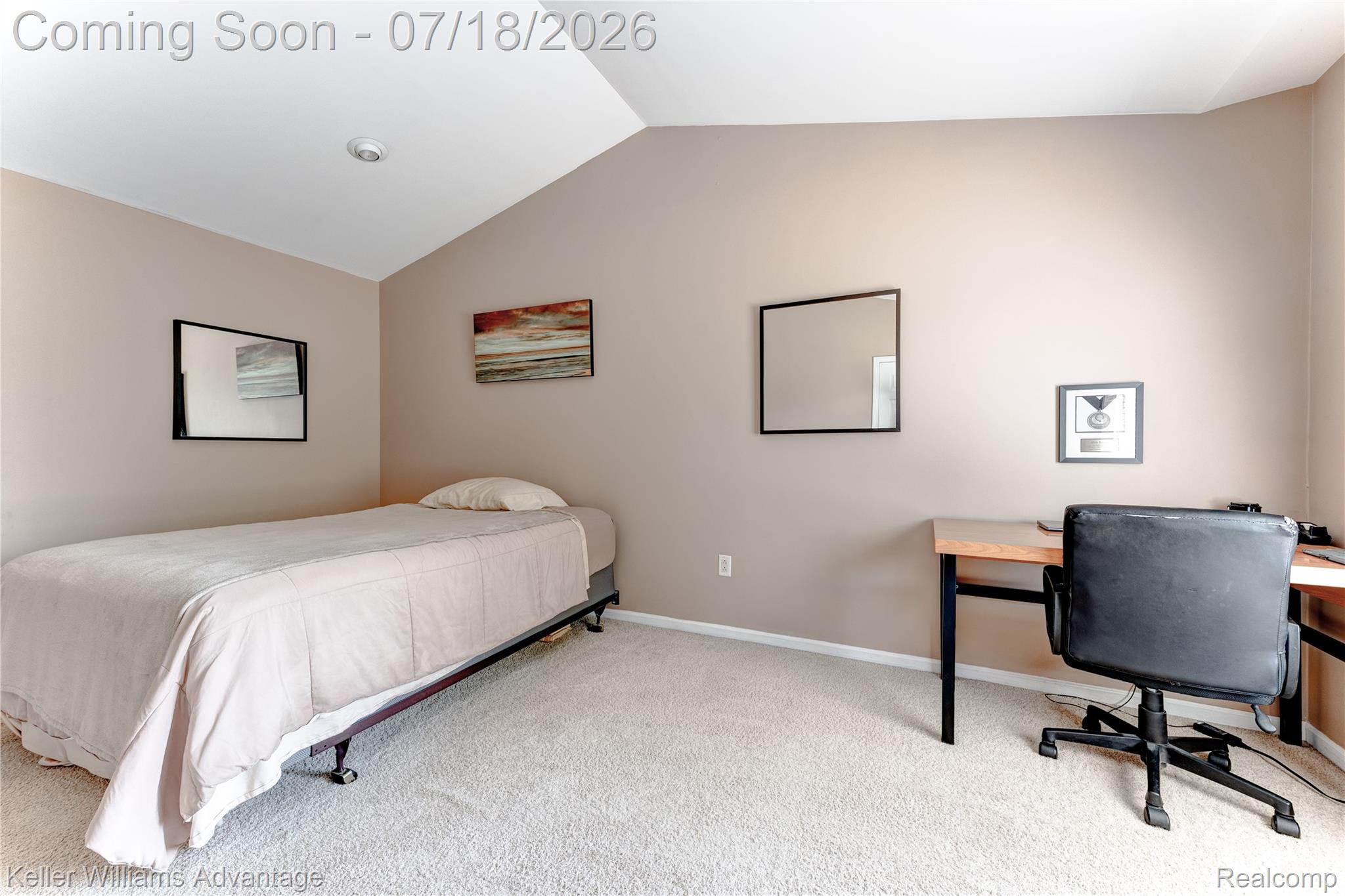 41647 Mitchell Road Novi, MI 48377 - Photo 31 of 43 Bedroom featuring vaulted ceilings, neutral wall color, and light-toned carpeting