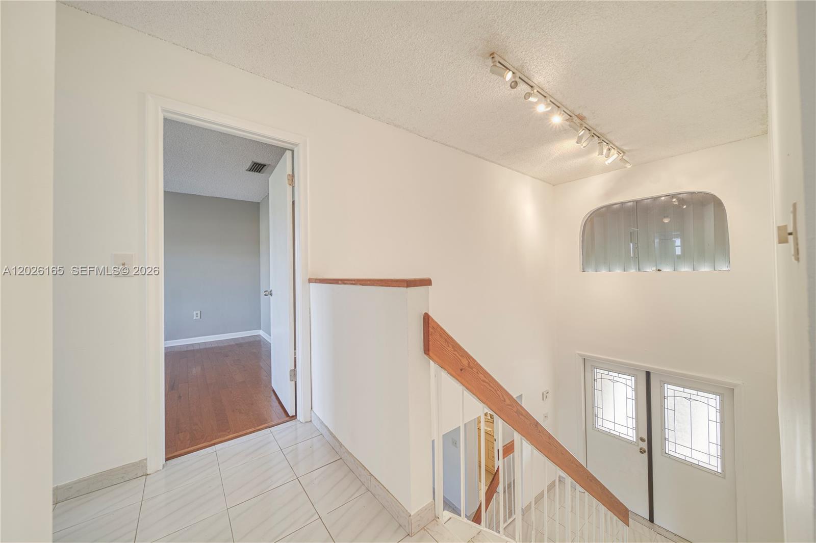13337 Southwest 64th Lane Miami, FL 33183 - Photo 21 of 36 a view of a hallway with entryway