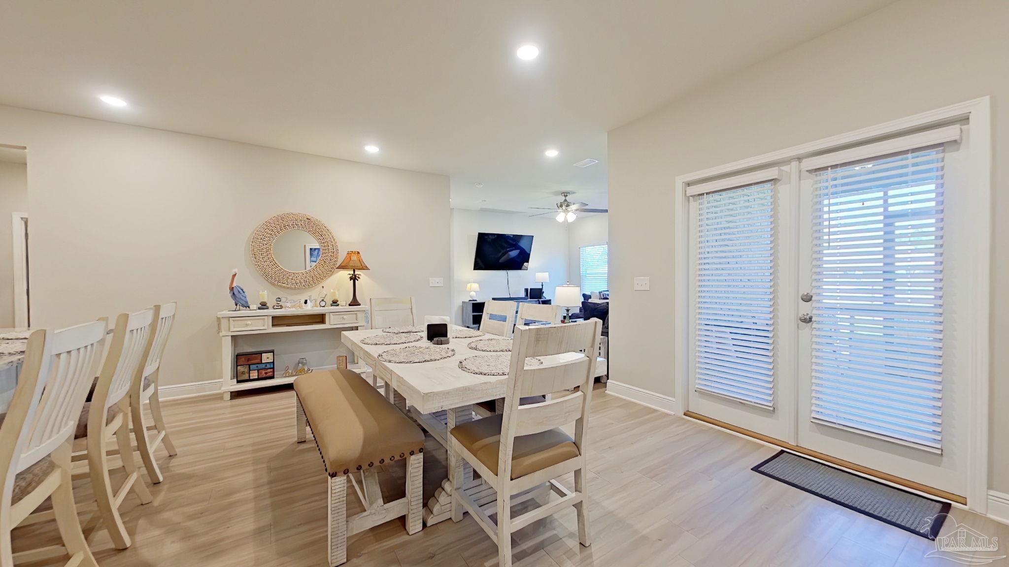 7715 Burnside Loop Pensacola, FL 32526 - Photo 6 of 36 French doors to Screened Porch and Back Yard