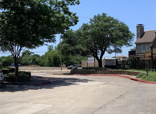 a view of street with houses
