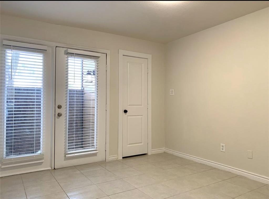 9803 Walnut Street, Unit 107 Dallas, TX 75243 - Photo 10 of 10 an empty room with windows