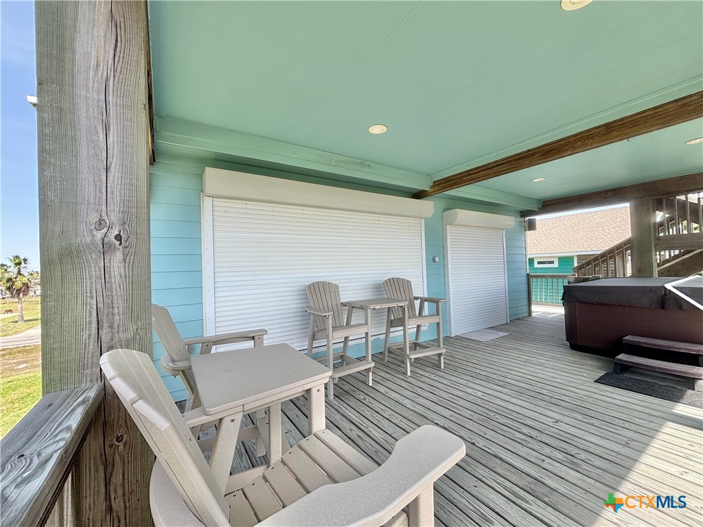 403 Maple Street Port O'Connor, TX 77982 - Photo 2 of 48 a living room with furniture and a wooden floor