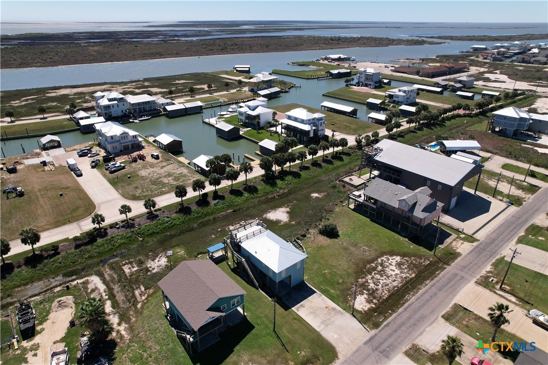 403 Maple Street Port O'Connor, TX 77982 - Photo 40 of 48 an aerial view of a house with a lake view