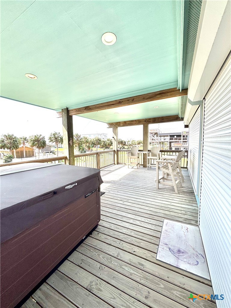 403 Maple Street Port O'Connor, TX 77982 - Photo 46 of 48 a view of a balcony with wooden floor