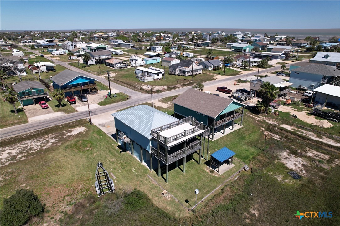 403 Maple Street Port O'Connor, TX 77982 - Photo 10 of 48 an aerial view of a residential houses with city view