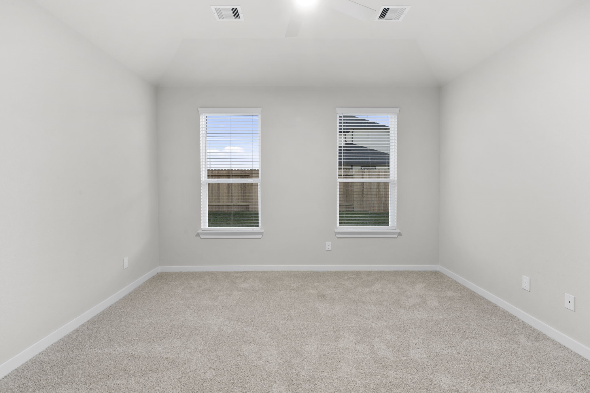 3015 Boulder Ridge Drive Rosenberg, TX 77471 - Photo 14 of 34 an empty room with windows