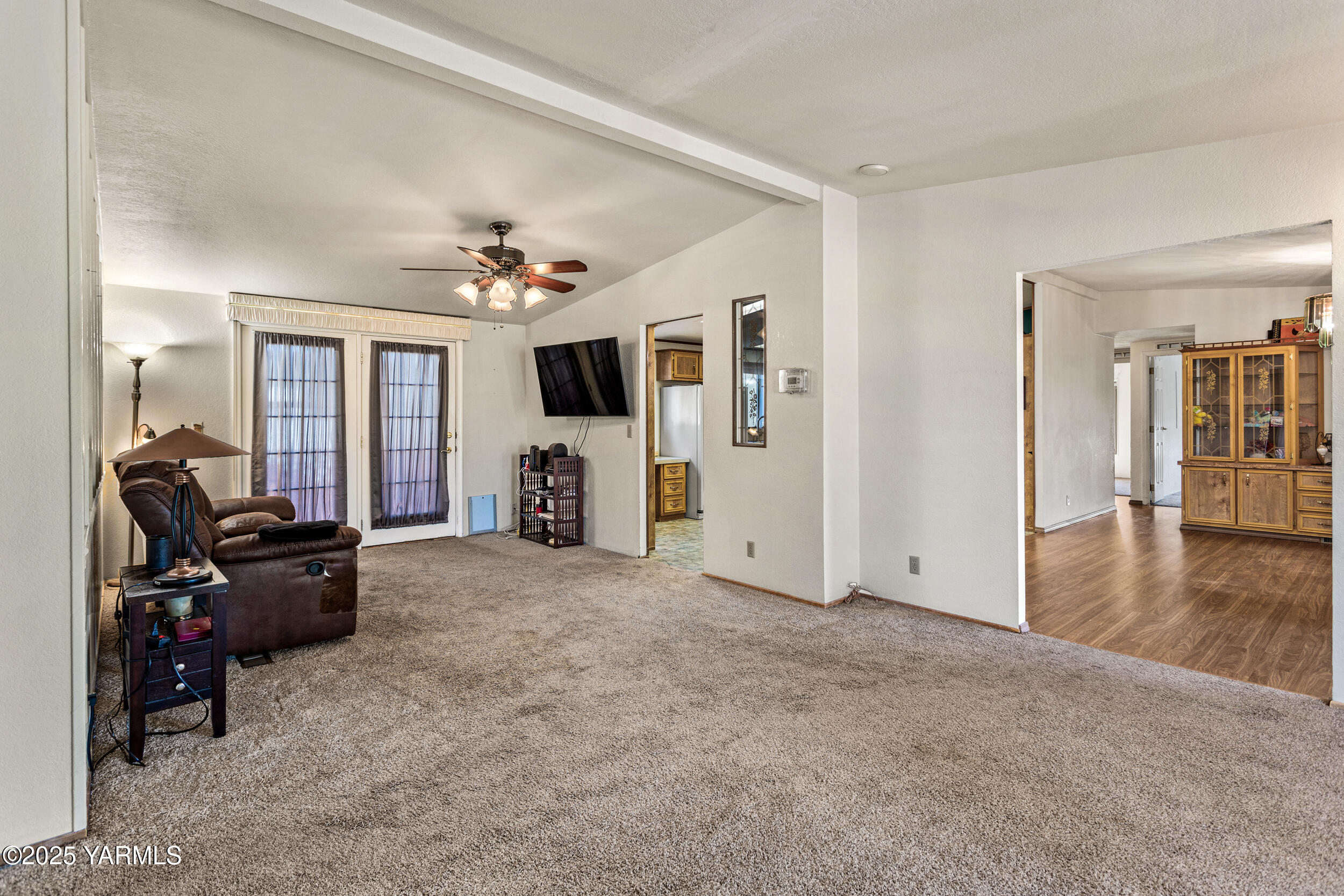 3701 Gun Club Road, Unit 64 Yakima, WA 98901 - Photo 12 of 30 a view of livingroom with furniture and flat screen tv