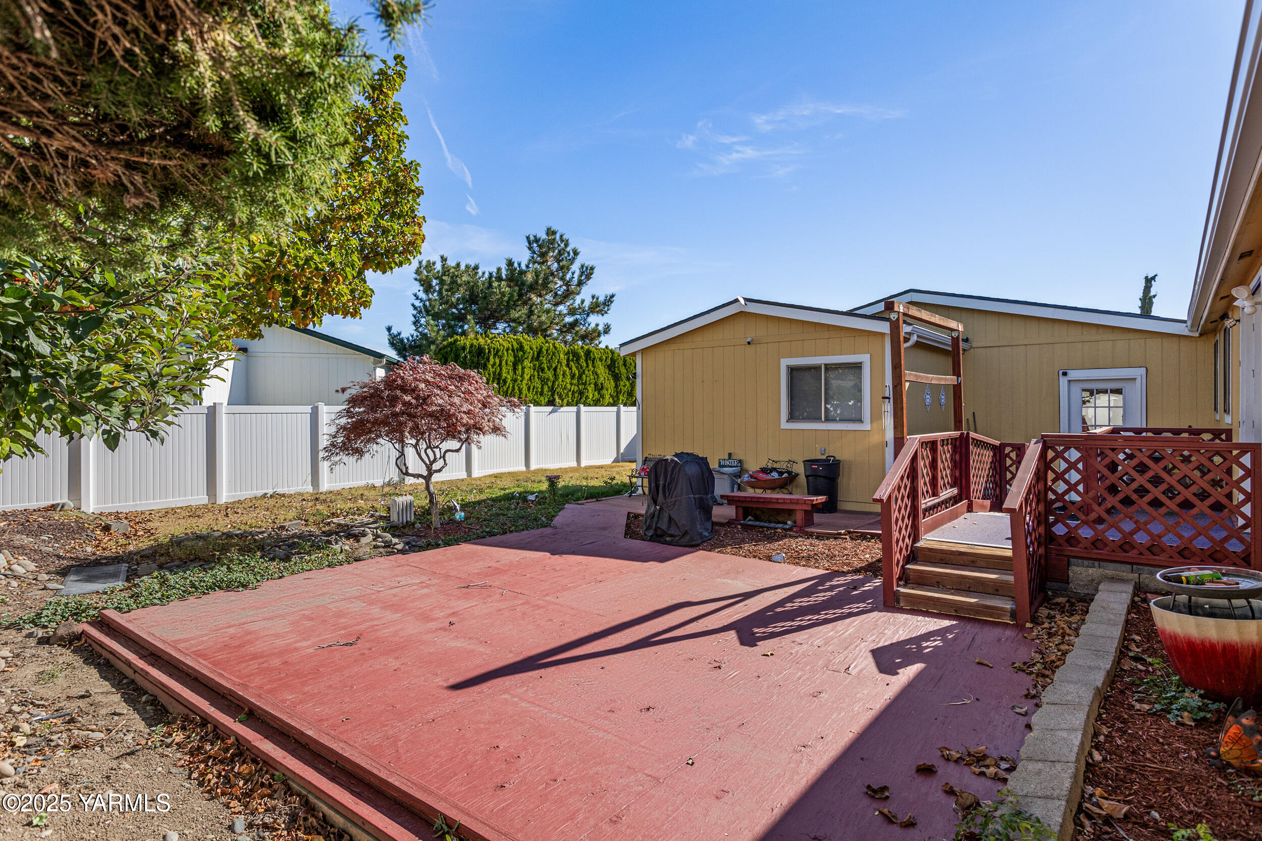 3701 Gun Club Road, Unit 64 Yakima, WA 98901 - Photo 29 of 30 a view of a backyard with sitting area
