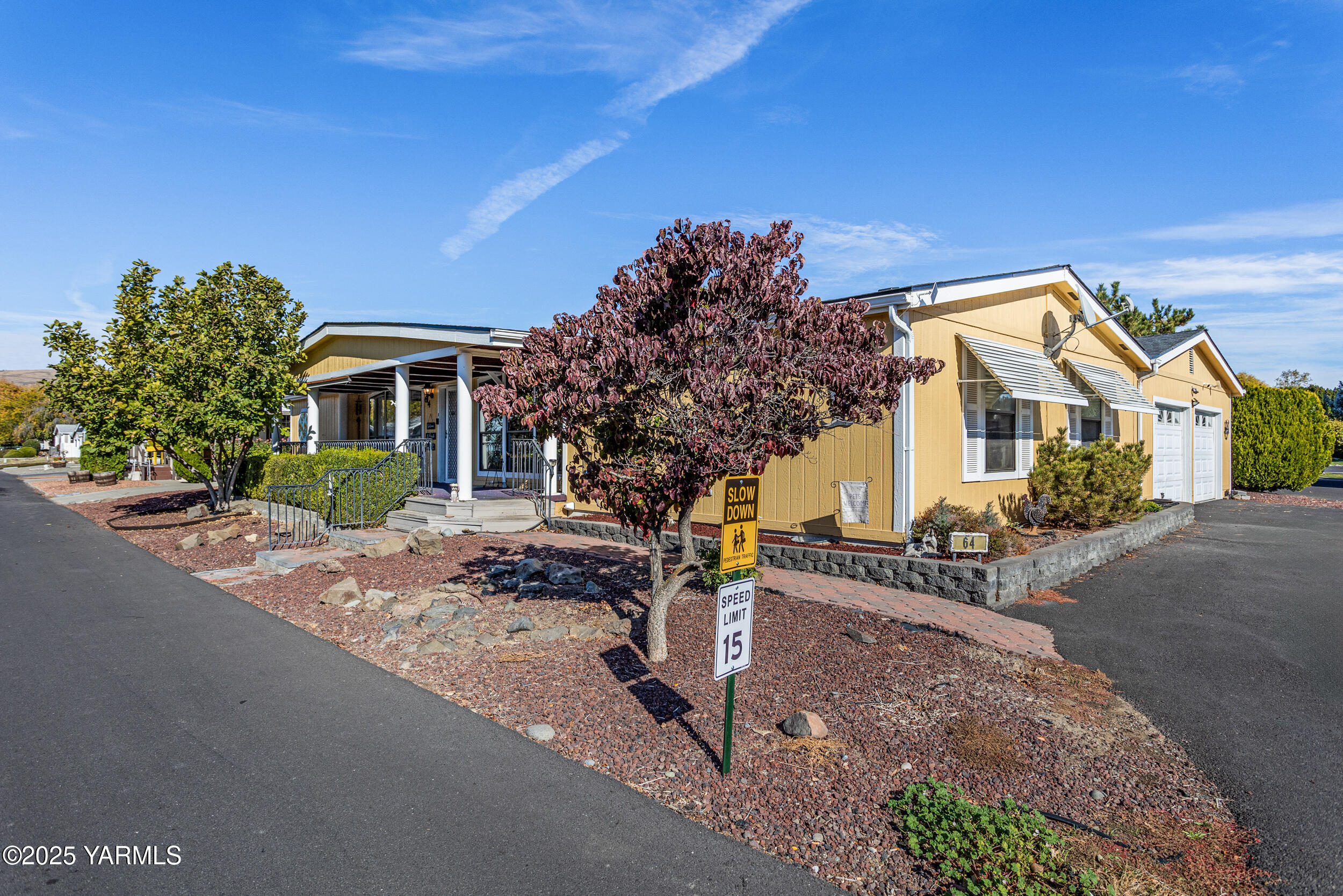 3701 Gun Club Road, Unit 64 Yakima, WA 98901 - Photo 30 of 30 a view of a house with a tree in front