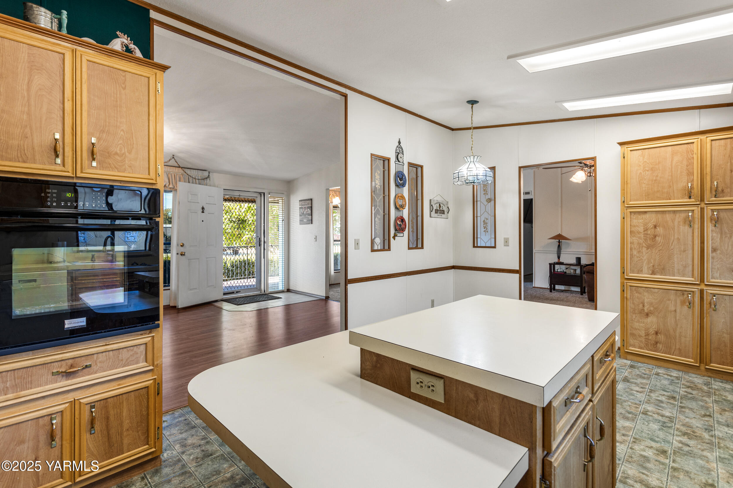 3701 Gun Club Road, Unit 64 Yakima, WA 98901 - Photo 10 of 30 a kitchen with stainless steel appliances a stove a refrigerator and cabinets