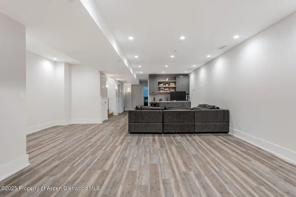 a living room with a couch and a couch