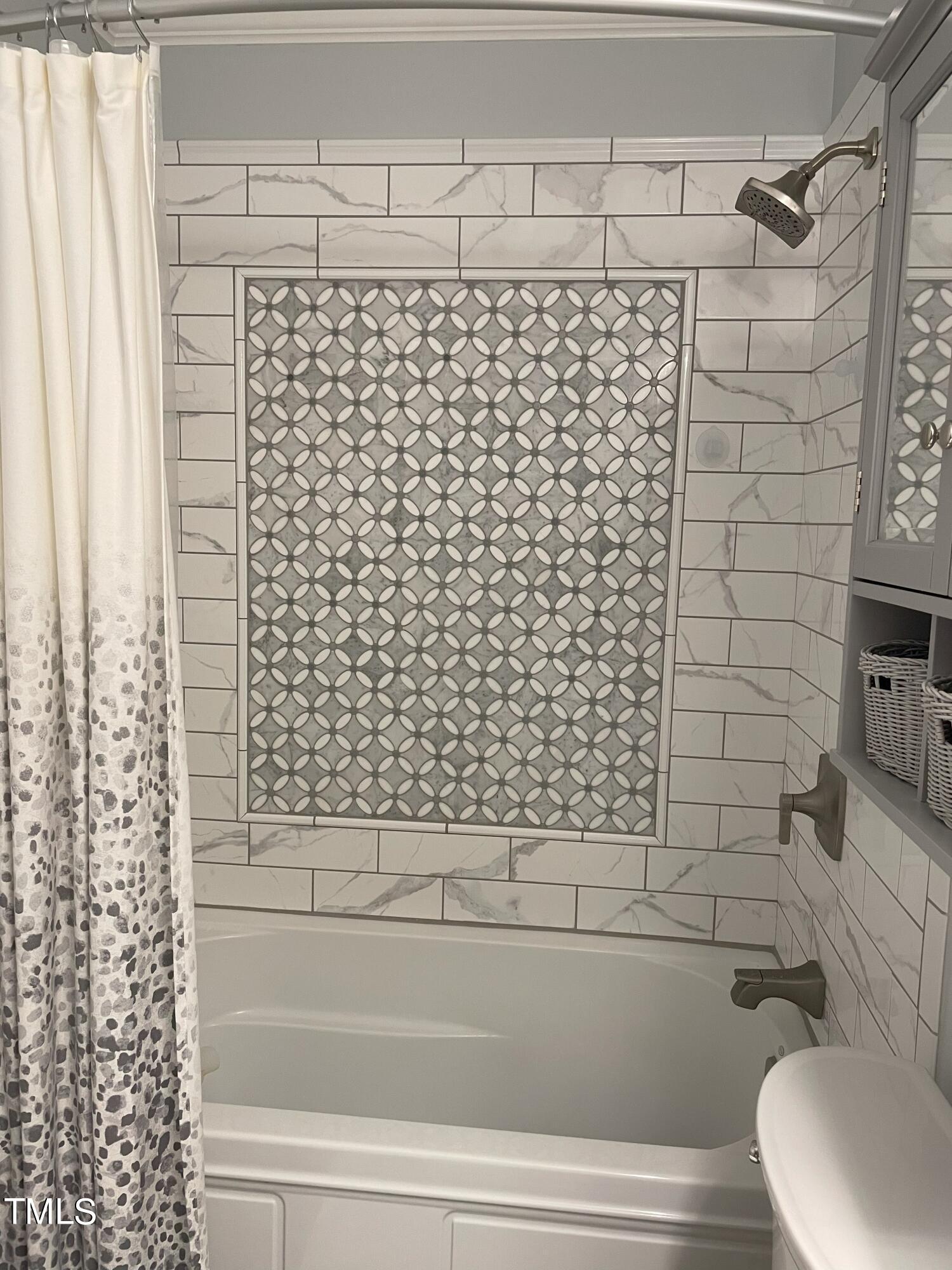 3033 Pearces Road Zebulon, NC 27597 - Photo 30 of 42 33_Bathroom_upstairs_shared between 3rd