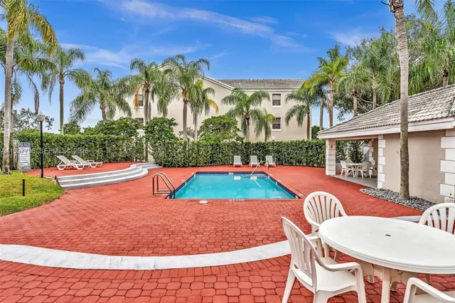 a view of outdoor space yard swimming pool and patio