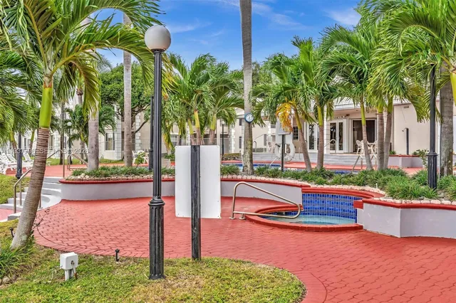 a front view of house with yard and outdoor seating