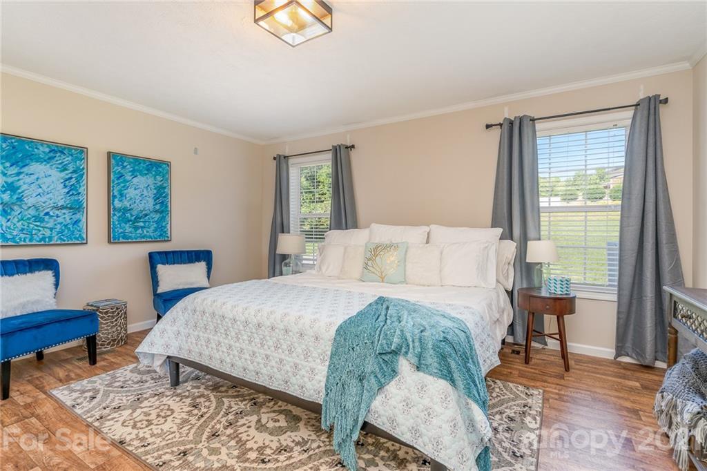 3782 Banoak Road Vale, NC 28168 - Photo 12 of 36 a bed room with a bed and a chair