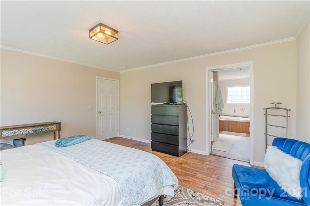 3782 Banoak Road Vale, NC 28168 - Photo 13 of 36 a bedroom with a bed and a couch