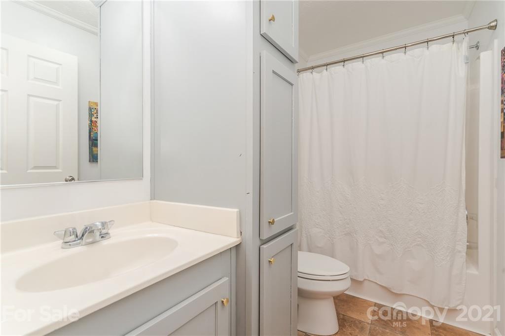 3782 Banoak Road Vale, NC 28168 - Photo 17 of 36 a bathroom with a sink a toilet and shower