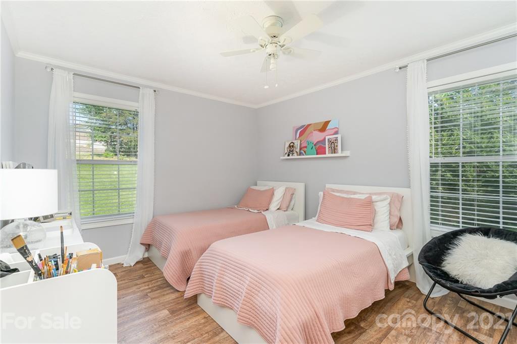3782 Banoak Road Vale, NC 28168 - Photo 18 of 36 a bedroom with two beds and a large window