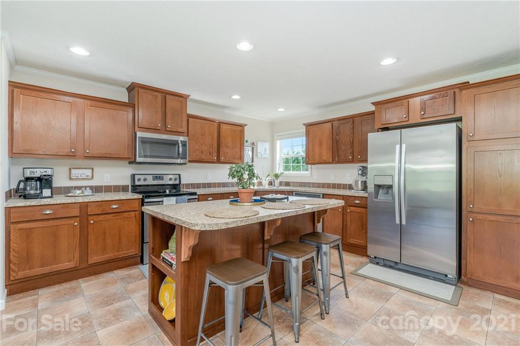 3782 Banoak Road Vale, NC 28168 - Photo 28 of 36 a kitchen with a sink a counter top space stainless steel appliances and cabinets