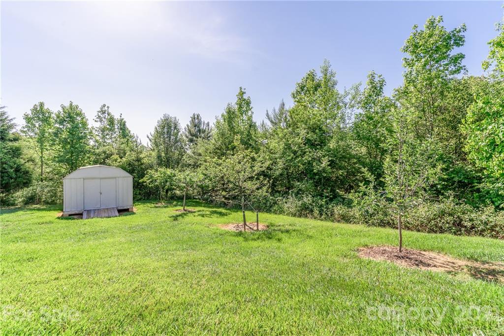 3782 Banoak Road Vale, NC 28168 - Photo 10 of 36 a garden with trees in the background