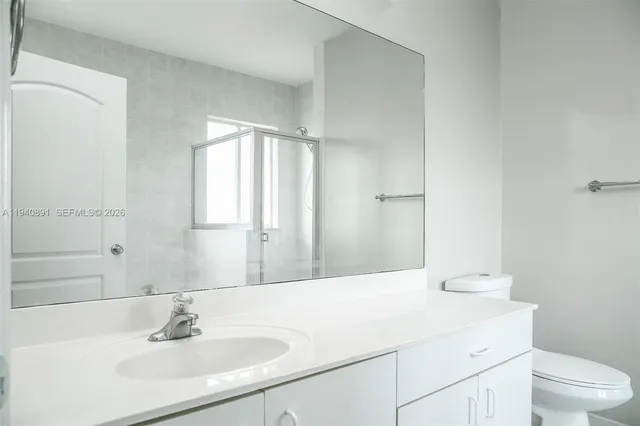 a bathroom with a sink and a toilet