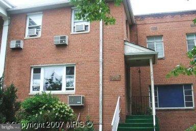 7910 Riggs Road Hyattsville, MD 20783 - Photo 1 of 1 a view of a brick house with large windows