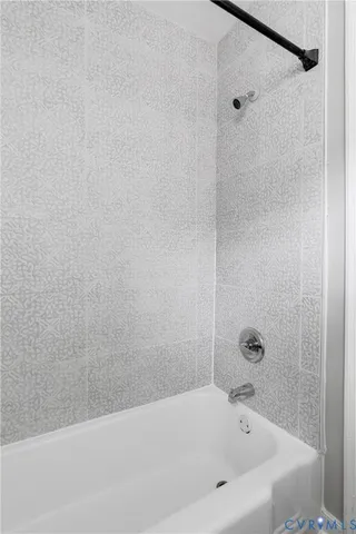 a bathroom with a bathtub