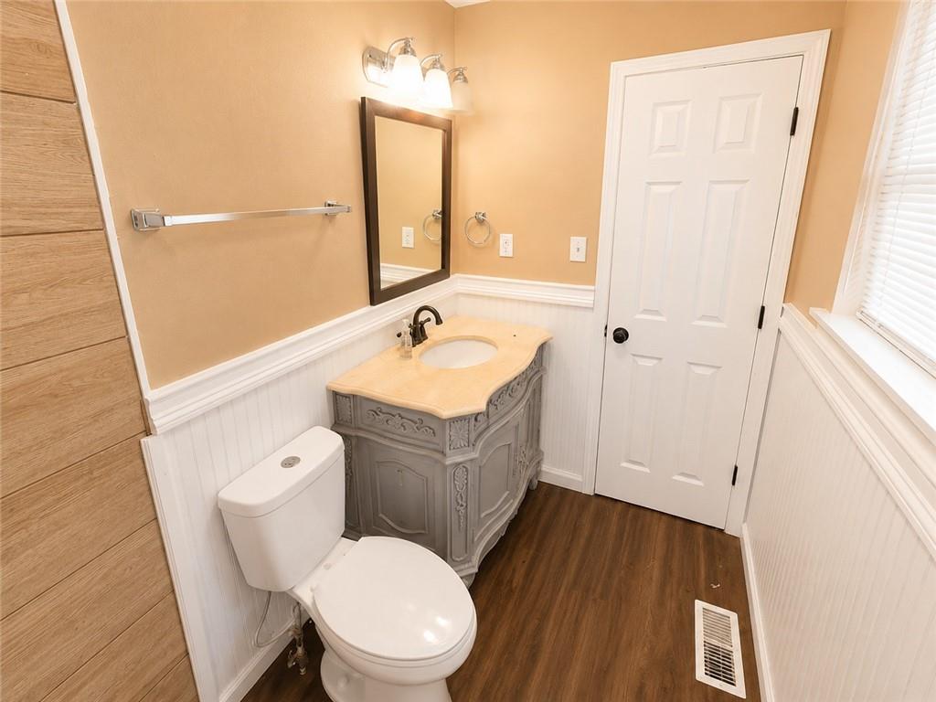1929 Wee Kirk Road Southeast Atlanta, GA 30316 - Photo 16 of 22 a bathroom with a sink a toilet and tub