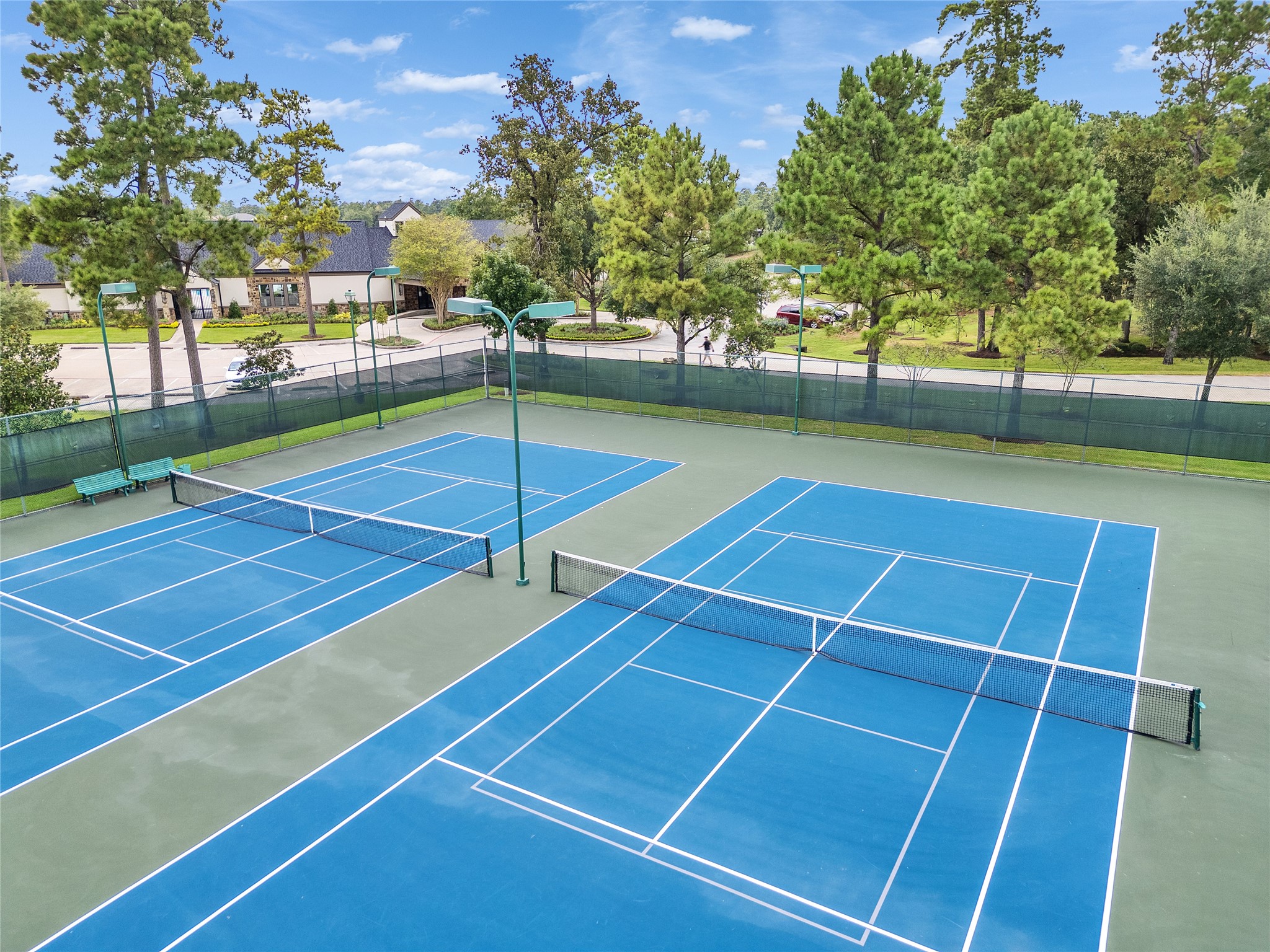 5802 Sunny Sky Place Spring, TX 77386 - Photo 15 of 28 a view of a tennis court