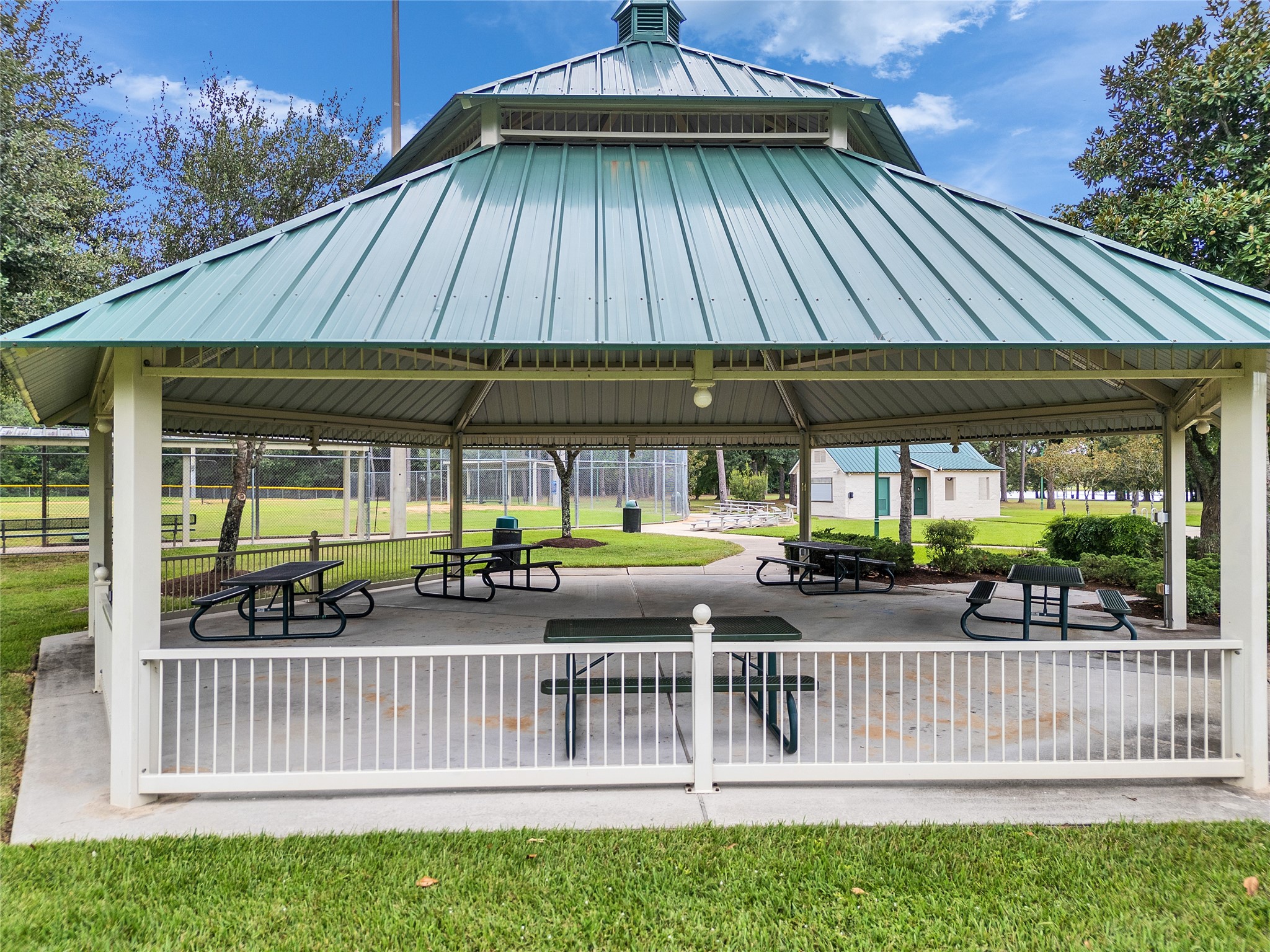 5802 Sunny Sky Place Spring, TX 77386 - Photo 17 of 28 a view of a chair and tables in the patio