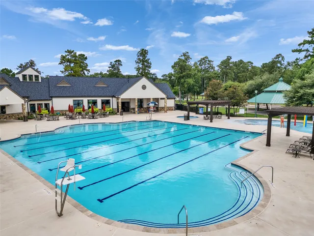 a view of a swimming pool from a balcony