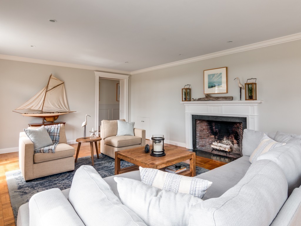 13 Cedar Street Wenham, MA 01984 - Photo 17 of 33 a living room with furniture and a fireplace