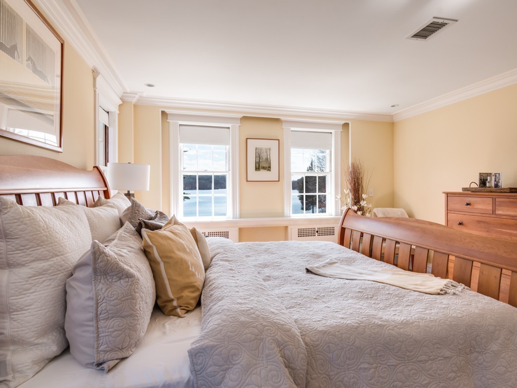 13 Cedar Street Wenham, MA 01984 - Photo 21 of 33 a bedroom with a large bed and a window
