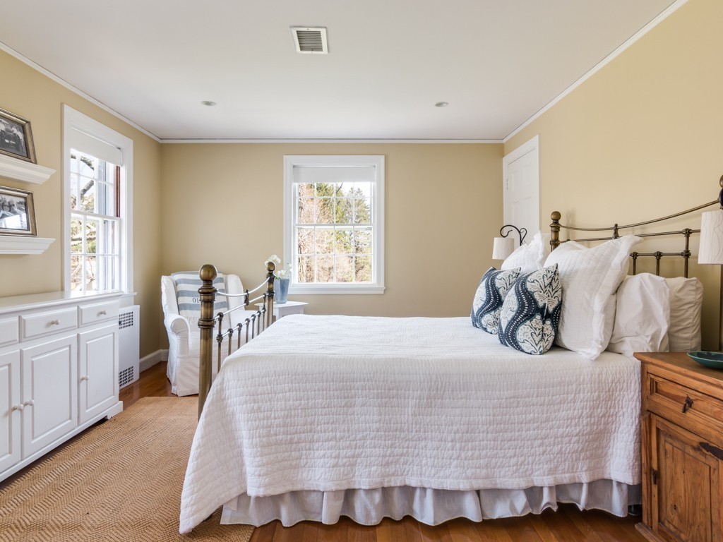 13 Cedar Street Wenham, MA 01984 - Photo 23 of 33 a bedroom with a bed and window