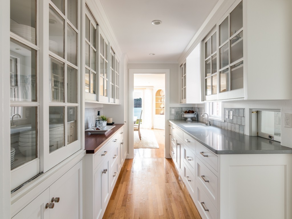 13 Cedar Street Wenham, MA 01984 - Photo 8 of 33 a kitchen with granite countertop a sink and cabinets