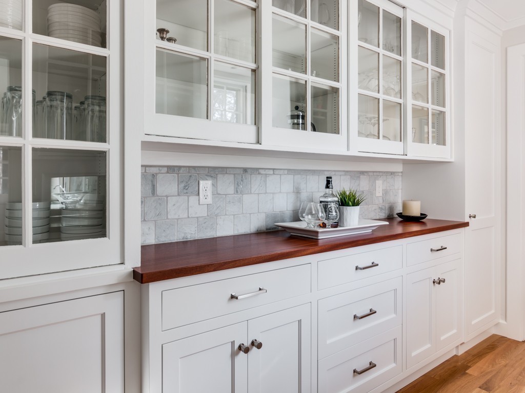 13 Cedar Street Wenham, MA 01984 - Photo 10 of 33 a kitchen with granite countertop white cabinets and white stainless steel appliances