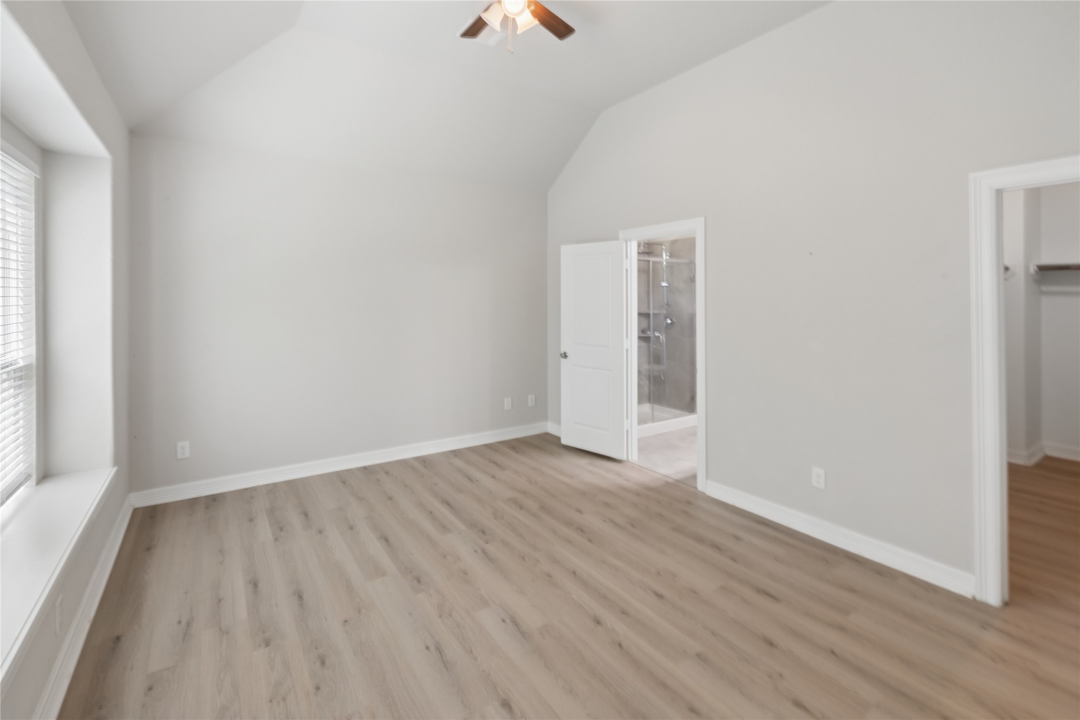 25131 Calvary Charge Magnolia, TX 77355 - Photo 13 of 20 an empty room with wooden floor and windows