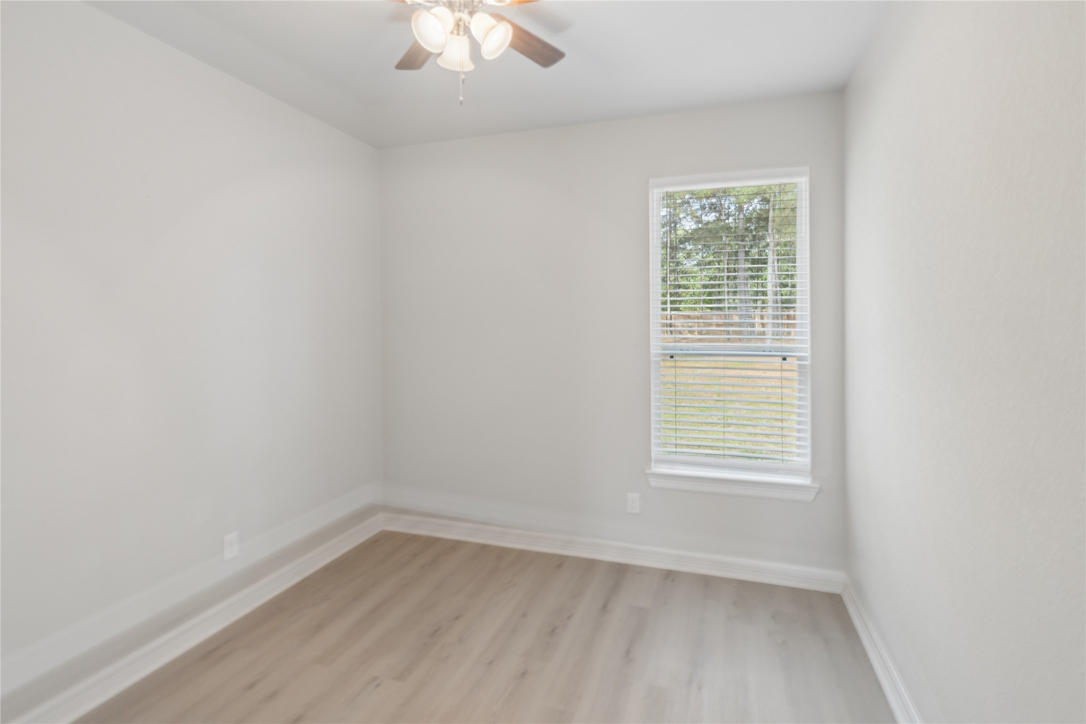 25131 Calvary Charge Magnolia, TX 77355 - Photo 9 of 20 an empty room with a window