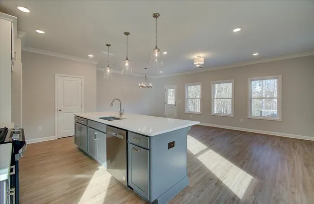 a kitchen with sink and window