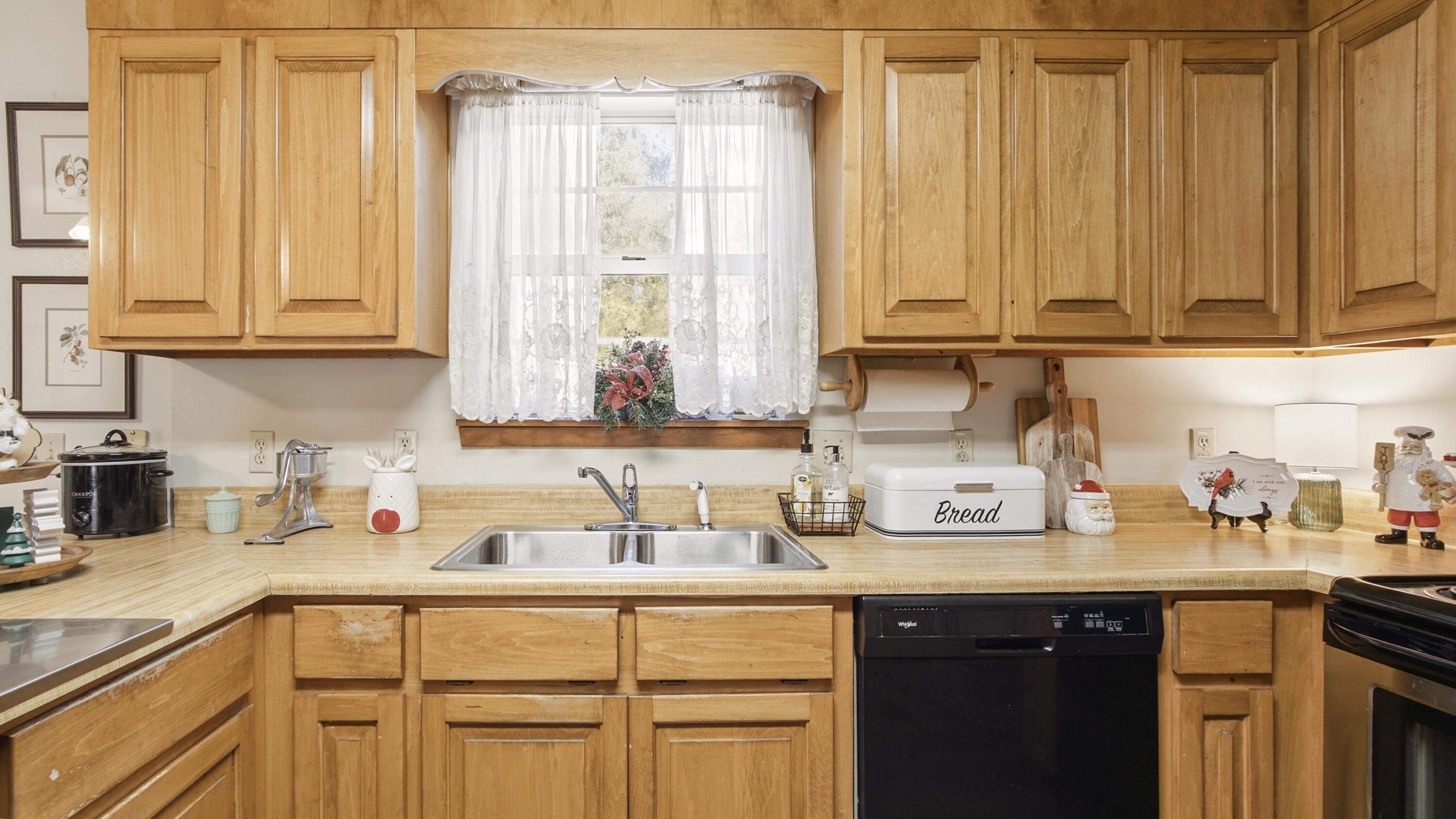 2186 Highway 90 DeFuniak Springs, FL 32433 - Photo 12 of 49 a kitchen with stainless steel appliances and cabinets