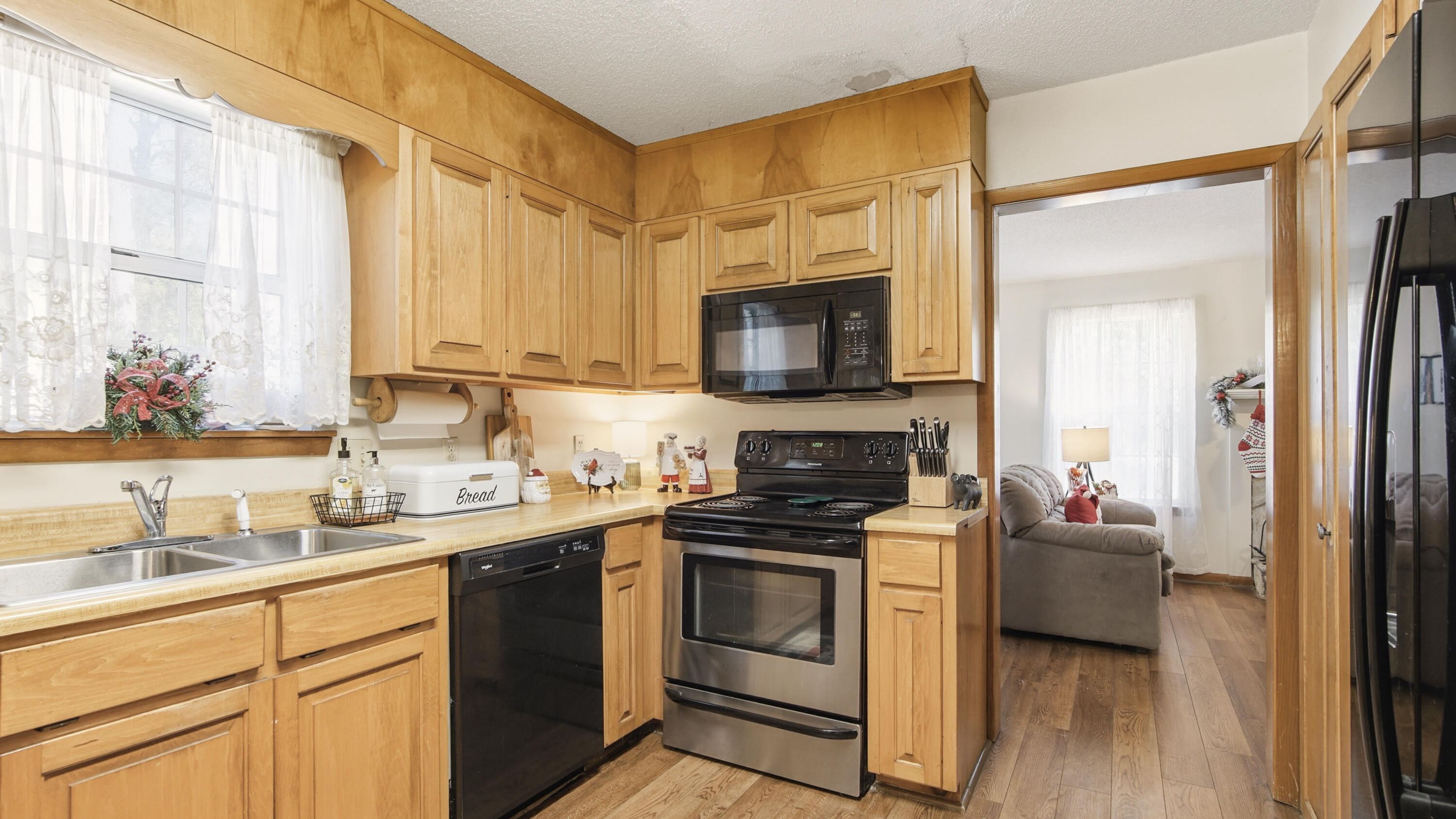 2186 Highway 90 DeFuniak Springs, FL 32433 - Photo 13 of 49 a kitchen with a sink stove and microwave
