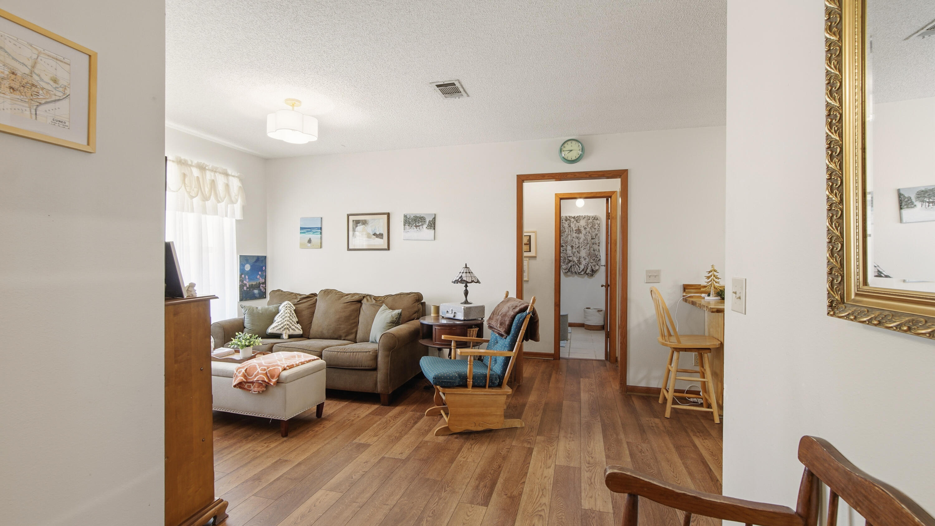 2186 Highway 90 DeFuniak Springs, FL 32433 - Photo 18 of 49 a living room with furniture and wooden floor