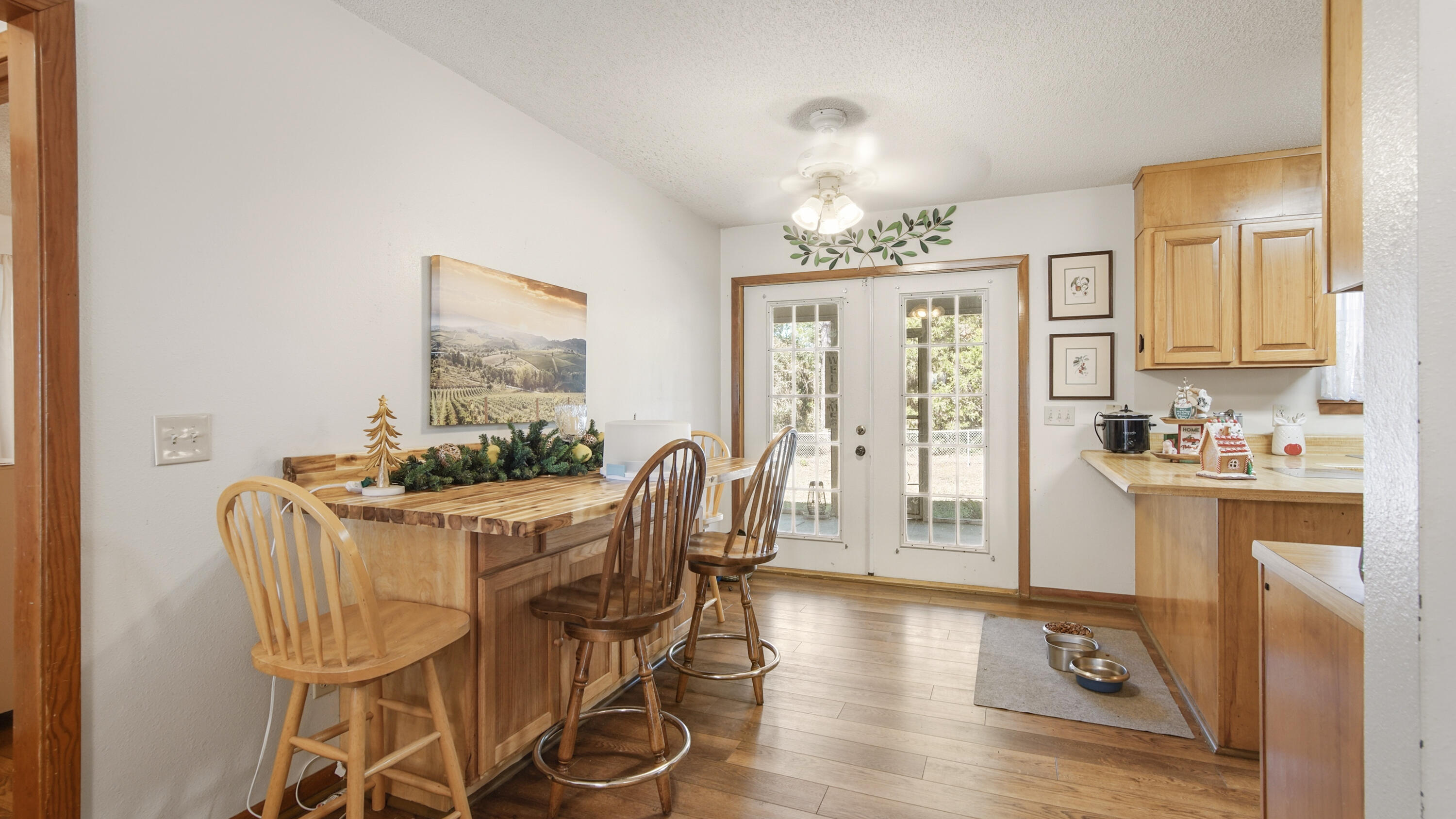 2186 Highway 90 DeFuniak Springs, FL 32433 - Photo 19 of 49 a view of a dining room with furniture window and wooden floor