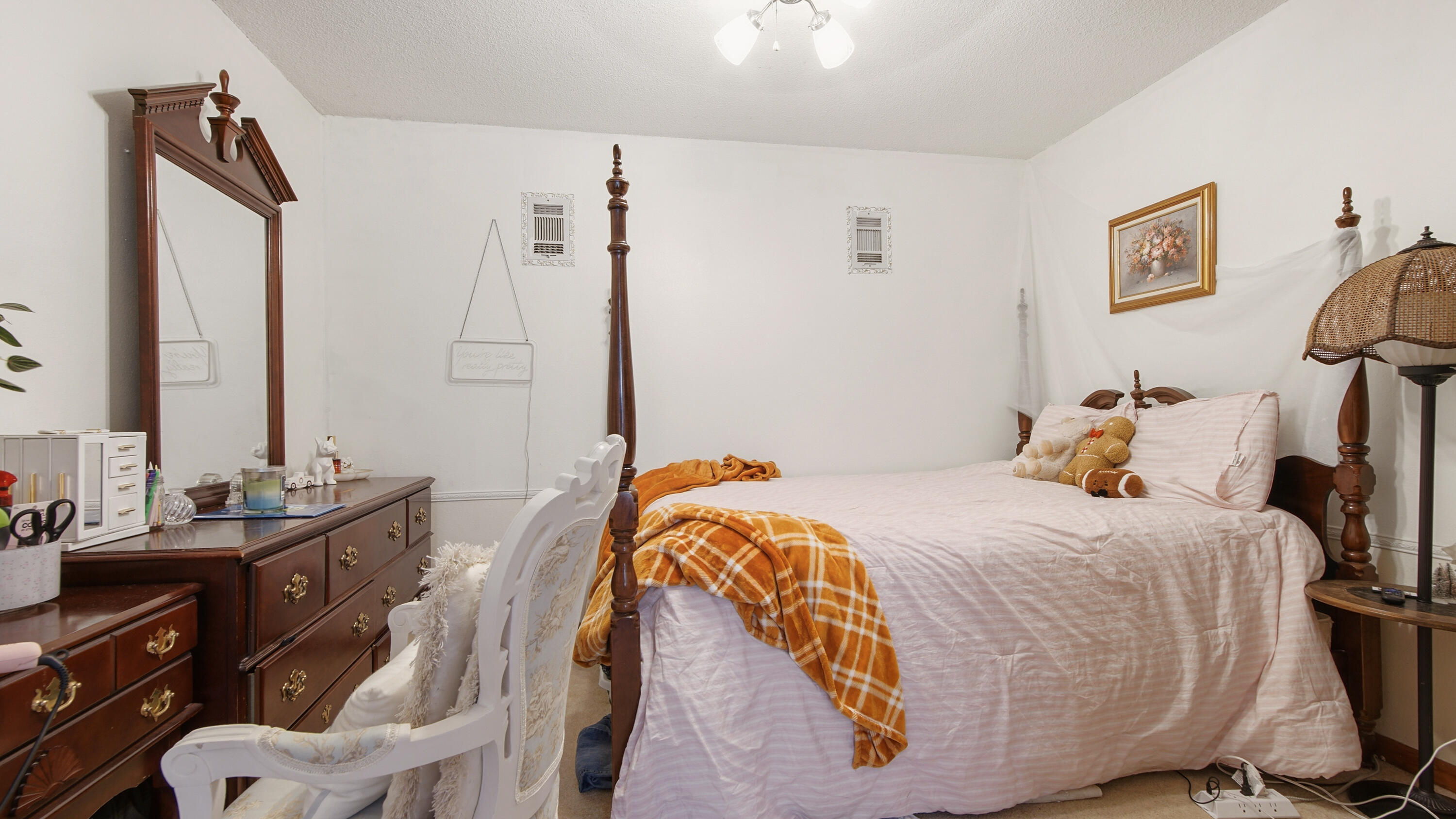 2186 Highway 90 DeFuniak Springs, FL 32433 - Photo 29 of 49 a bedroom with a bed and wooden floor