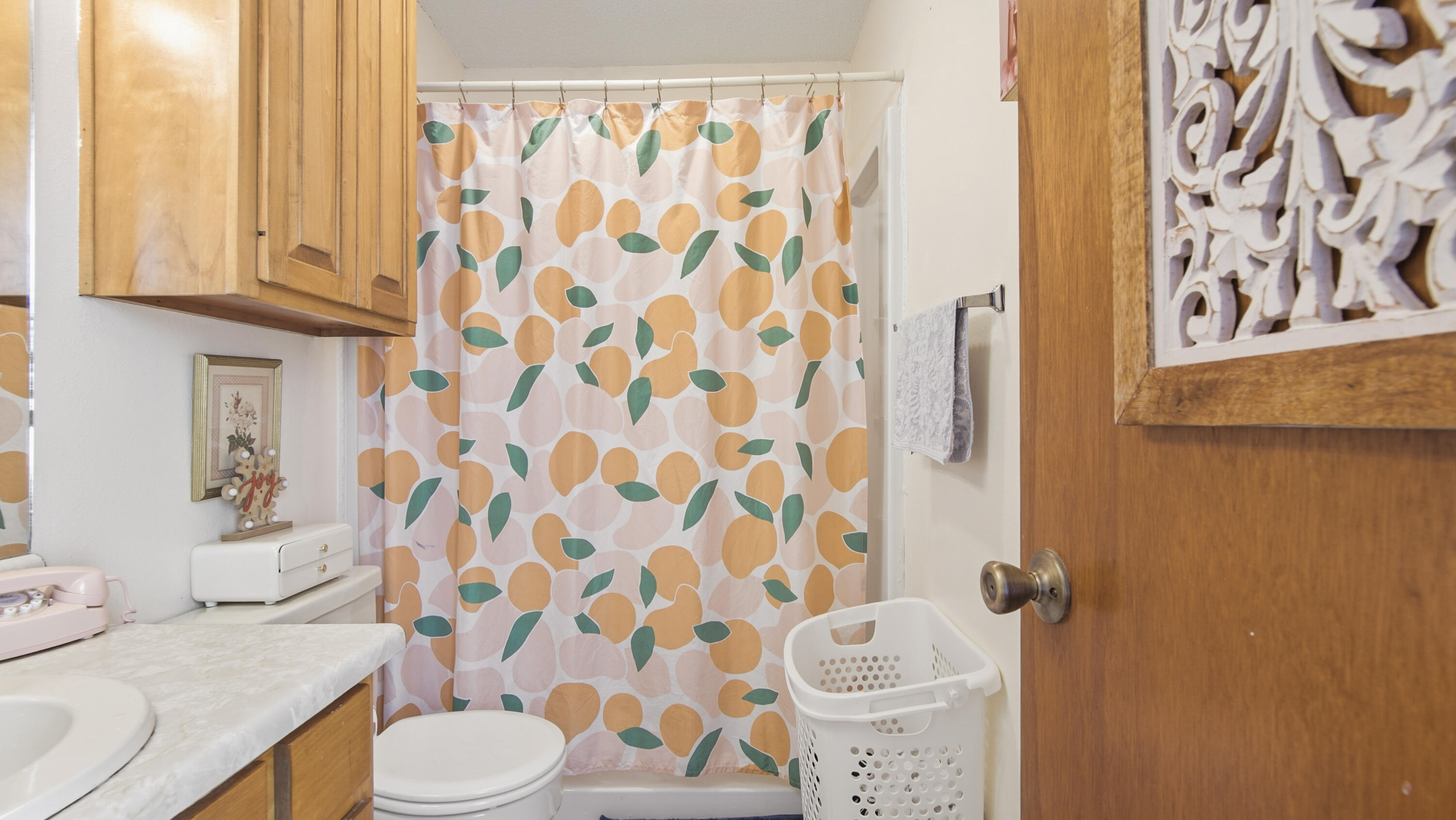2186 Highway 90 DeFuniak Springs, FL 32433 - Photo 31 of 49 a bathroom with a toilet and a shower curtain