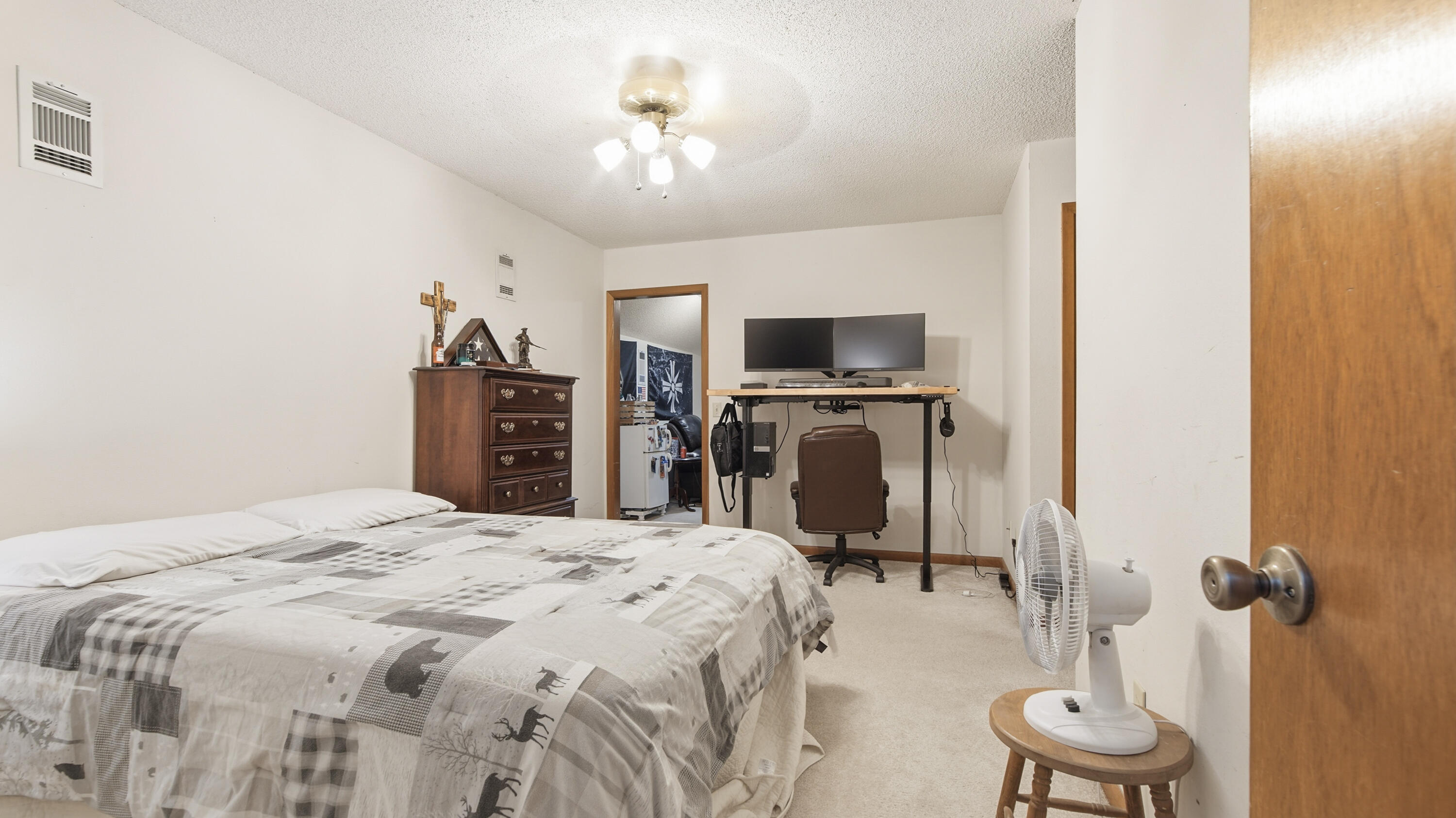 2186 Highway 90 DeFuniak Springs, FL 32433 - Photo 33 of 49 a bedroom with a bed and a flat screen tv